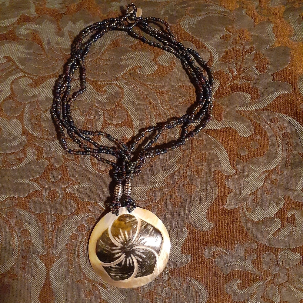 Carved flower on abalone shell beaded necklace